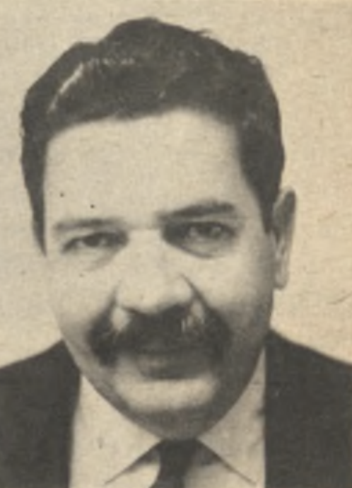 Jose Coleman, co-chairman of the ABC project along with John Lovas (La Voz, 1968) A black and white portrait of a man with a thick mustache and dark, neatly combed hair, and wearing a dark suit with a white shirt.