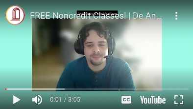 young man in headphones talking on screen