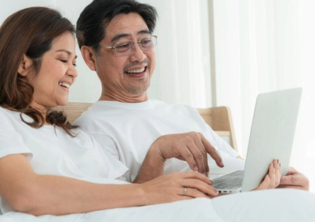 couple looking at laptop