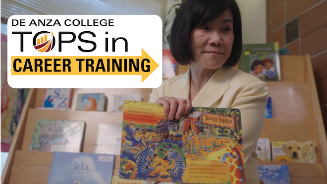 teacher holding children's book