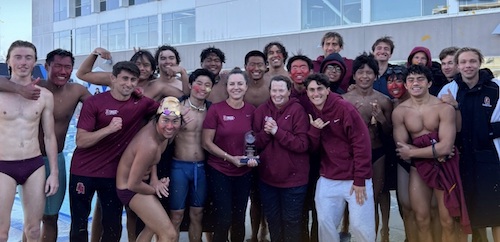 mens swim and dive team celebrating at pool